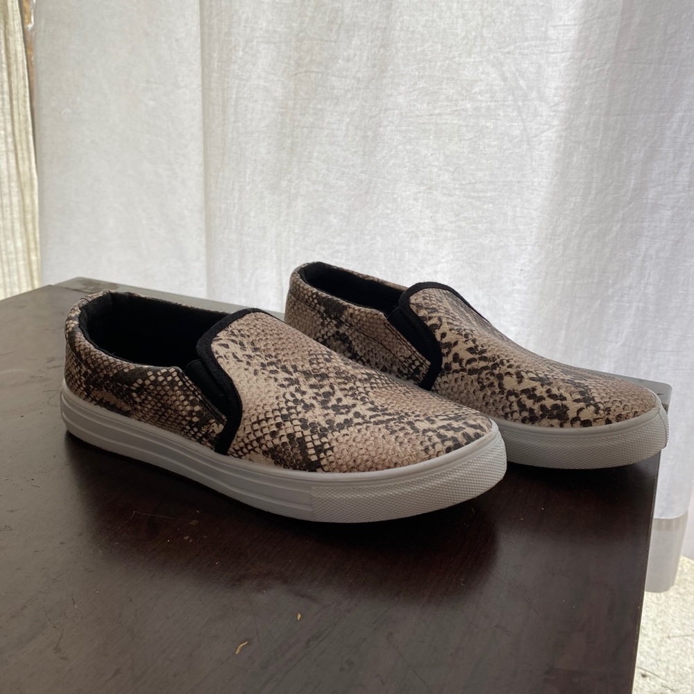 Snakeskin slip ons